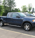 ford f 150 2005 blue gasoline 8 cylinders 4 wheel drive automatic with overdrive 13502