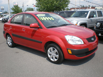 kia rio 2009 red sedan gasoline 4 cylinders front wheel drive automatic with overdrive 13502