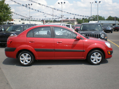 kia rio 2009 red sedan gasoline 4 cylinders front wheel drive automatic with overdrive 13502