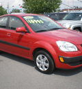 kia rio 2009 red sedan gasoline 4 cylinders front wheel drive automatic with overdrive 13502