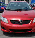 toyota corolla 2009 red sedan le gasoline 4 cylinders front wheel drive automatic 47129