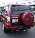 suzuki xl7 2006 red suv gasoline 6 cylinders 4 wheel drive automatic with overdrive 98371