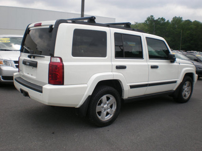 jeep commander 2006 white suv gasoline 6 cylinders 4 wheel drive automatic 13502