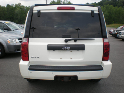 jeep commander 2006 white suv gasoline 6 cylinders 4 wheel drive automatic 13502