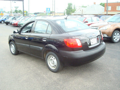 kia rio 2009 black sedan gasoline 4 cylinders front wheel drive manual 45324