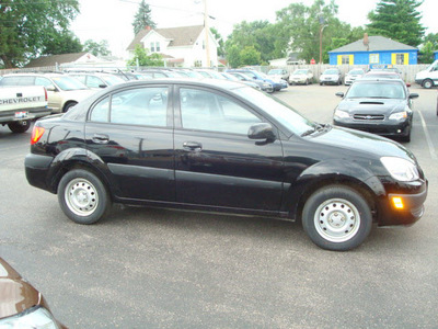 kia rio 2009 black sedan gasoline 4 cylinders front wheel drive manual 45324