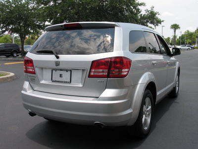 dodge journey 2009 silver suv sxt gasoline 6 cylinders front wheel drive automatic 33912