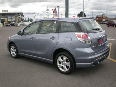 toyota matrix 2006 lt blue hatchback gasoline 4 cylinders all whee drive automatic with overdrive 13502