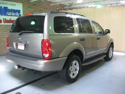 dodge durango 2005 khaki suv limited gasoline 8 cylinders 4 wheel drive automatic 44883