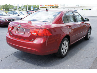 kia optima 2009 red sedan lx gasoline 4 cylinders front wheel drive not specified 28677