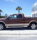 ford f 150 2011 brown lariat flex fuel 8 cylinders 4 wheel drive automatic 32401