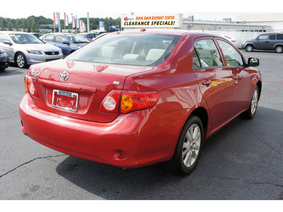 toyota corolla 2009 red sedan le gasoline 4 cylinders front wheel drive not specified 28677