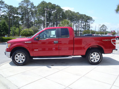 ford f 150 2011 red xlt gasoline 6 cylinders 4 wheel drive automatic 32401