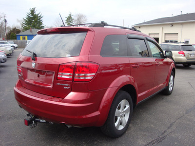 dodge journey 2009 inferno red suv sxt gasoline 6 cylinders front wheel drive automatic 45324