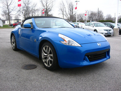 nissan 370z 2010 blue coupe roadster touring gasoline 6 cylinders rear wheel drive 6 speed manual 45840