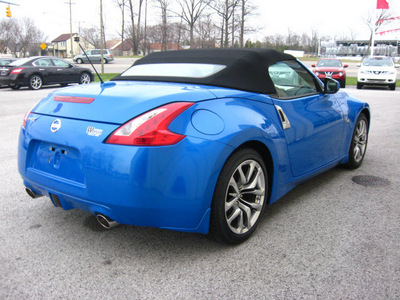 nissan 370z 2010 blue coupe roadster touring gasoline 6 cylinders rear wheel drive 6 speed manual 45840
