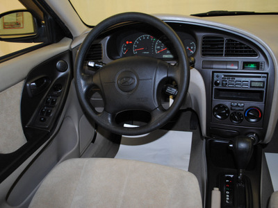hyundai elantra 2003 gold sedan gls gasoline 4 cylinders dohc front wheel drive automatic 44060