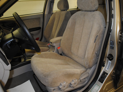 hyundai elantra 2003 gold sedan gls gasoline 4 cylinders dohc front wheel drive automatic 44060