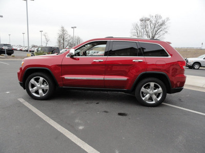 jeep grand cherokee 2011 red suv overland gasoline 8 cylinders 4 wheel drive 5 speed automatic 60915