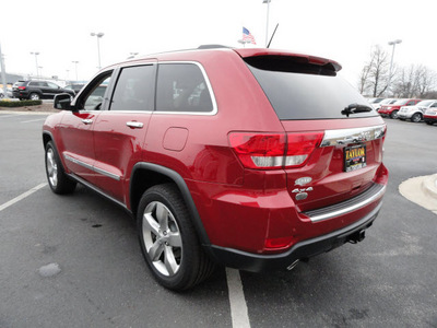 jeep grand cherokee 2011 red suv overland gasoline 8 cylinders 4 wheel drive 5 speed automatic 60915