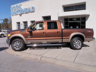 ford f 250 super duty 2011 brown lariat biodiesel 8 cylinders 4 wheel drive automatic with overdrive 32401