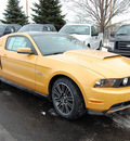 ford mustang 2011 orange coupe gasoline 8 cylinders rear wheel drive manual 46168