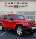 jeep wrangler unlimited 2011 red suv sahara gasoline 6 cylinders 4 wheel drive automatic 60915