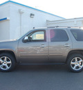 chevrolet tahoe 2011 brown suv ls flex fuel 8 cylinders 4 wheel drive automatic 27591