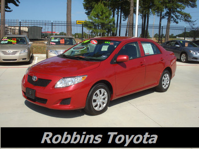 toyota corolla 2010 red sedan le gasoline 4 cylinders front wheel drive automatic 75503