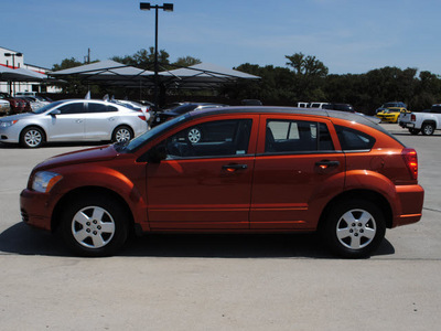 dodge caliber 2007 orange hatchback gasoline 4 cylinders front wheel drive automatic 76087