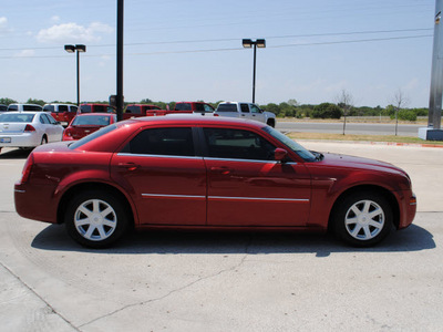 chrysler 300 2007 red sedan touring gasoline 6 cylinders rear wheel drive automatic 76087