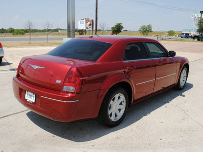 chrysler 300 2007 red sedan touring gasoline 6 cylinders rear wheel drive automatic 76087