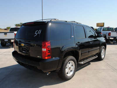 chevrolet tahoe 2011 black suv lt flex fuel 8 cylinders 4 wheel drive automatic 76087