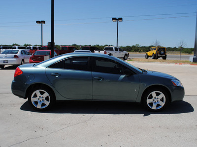 pontiac g6 2009 teal sedan gasoline 4 cylinders front wheel drive automatic 76087