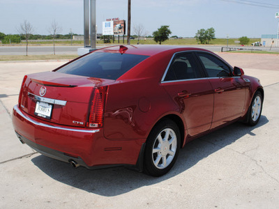 cadillac cts 2009 red sedan gasoline 6 cylinders rear wheel drive automatic 76087