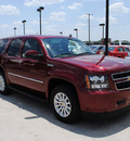 chevrolet tahoe hybrid 2011 red suv hybrid 8 cylinders 2 wheel drive automatic 76087