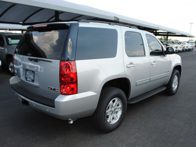 gmc yukon 2011 pure silve suv sle flex fuel 8 cylinders 2 wheel drive automatic 76087