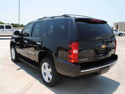 chevrolet tahoe 2011 black suv ltz flex fuel 8 cylinders 4 wheel drive 6 speed automatic 76087