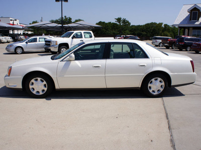 cadillac deville 2001 white sedan gasoline 8 cylinders dohc front wheel drive automatic 76087