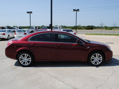 saturn aura 2009 maroon sedan xe gasoline 4 cylinders front wheel drive automatic 76087