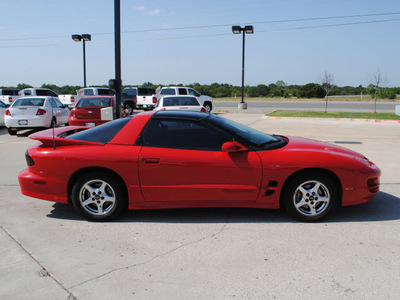 pontiac firebird 1998 red hatchback trans am gasoline 8 cylinders rear wheel drive 6 speed manual 76087