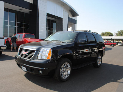 gmc yukon 2011 carbon bla suv slt flex fuel 8 cylinders 2 wheel drive automatic 76087