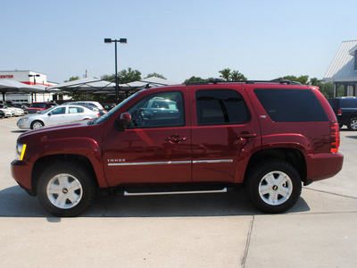 chevrolet tahoe 2010 red suv z71 flex fuel 8 cylinders 4 wheel drive automatic 76087