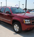 chevrolet tahoe 2010 red suv lt flex fuel 8 cylinders 4 wheel drive automatic 76087