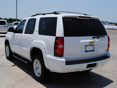 chevrolet tahoe 2011 white suv lt flex fuel 8 cylinders 4 wheel drive 6 speed automatic 76087