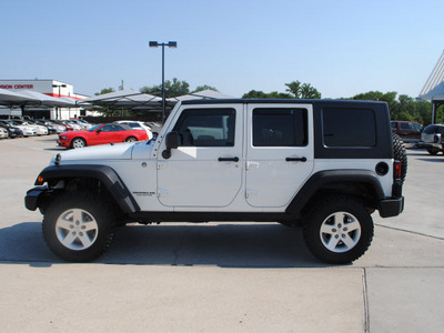 jeep wrangler unlimited 2009 white suv gasoline 6 cylinders 4 wheel drive automatic with overdrive 76087