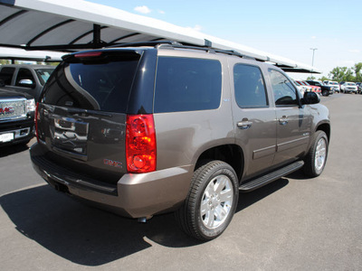 gmc yukon 2011 mocha stee suv slt flex fuel 8 cylinders 2 wheel drive automatic 76087