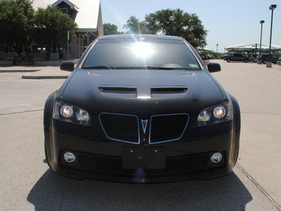 pontiac g8 2009 black sedan gt gasoline 8 cylinders rear wheel drive automatic 76087