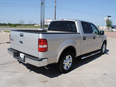 ford f 150 2006 silver lariat flex fuel 8 cylinders rear wheel drive automatic with overdrive 76087