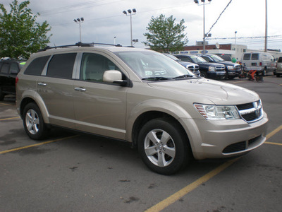 dodge journey 2009 gold suv sxt gasoline 6 cylinders front wheel drive automatic 13502